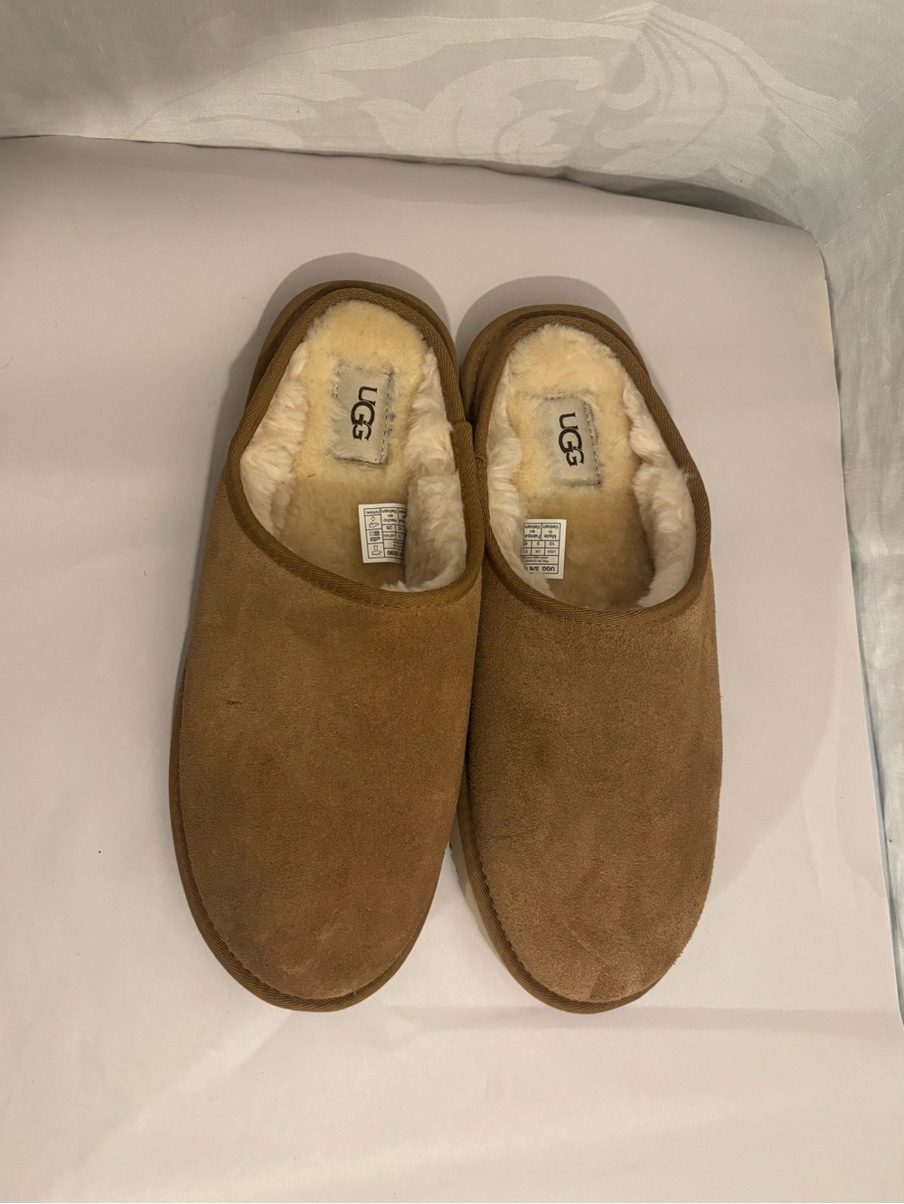 UGG classic slip-on Slipper
   Men’s size 10 
New without box